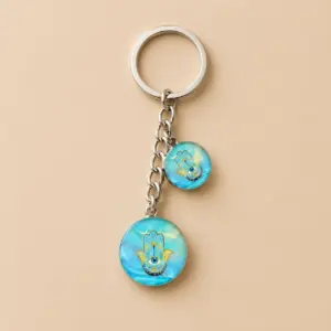Llavero Mano de Fátima (Hamsa) cabujon de cristal